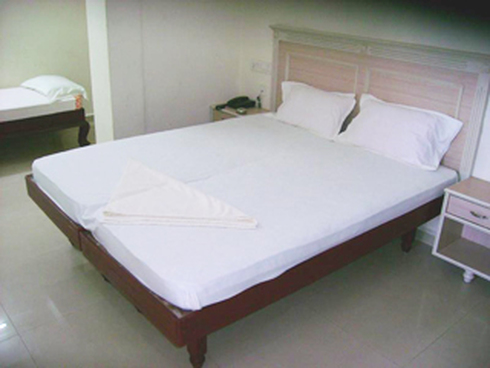 Bedroom at Annapurna Residency Hotel